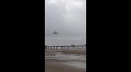 HM Coastguard helicopter joins in the search for a person who was seen to enter the sea on the north side of North Pier Blackpool.