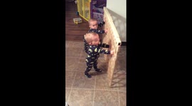 Twins breaking into kitchen