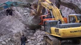 Construction worker pulled from under huge boulder in China