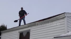 US man breaks gutter while clearing his roof of snow