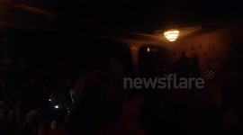 Audience sing and dance during cinema powercut