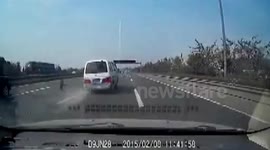 Minibus tyre sent flying into China traffic