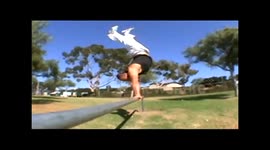 Acrobat handstand walks around Laguna Beach