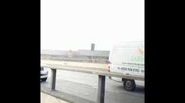 Car in flames after driver miraculously rescued on A40