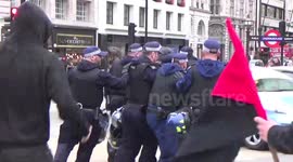 'Britain First' and anti-racist protests clash in London