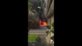 Car burns after  'cross-dressing armed robbery' in Yorkshire, UK