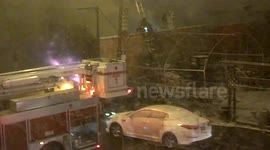 Firefighters battle US house fire