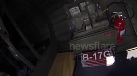 B-17 Flying Fortress drops skydivers from bomb bay doors at Chicagoland Skydiving Center