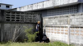 Puppy rescued after getting stuck in narrow gap between two walls