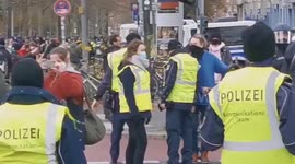 Hundreds join protest against Germany's COVID-19 restrictions in Berlin