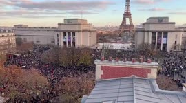Thousands take to the streets of Paris to protest France's new law criminalising images of police