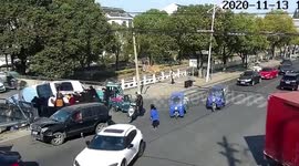Passersby lift car to free boy trapped underneath after dramatic collision in eastern China