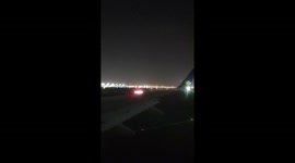 Plane landing at dubai International Airport