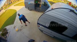 Amazon delivery man drops package in dirt pile outside front door