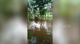 Residents stranded after heavy rain causes flooding in Indonesia