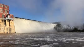 Reservoir in South Carolina flows over dam after recent rains