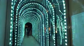 Magic lights reflections in the mirrors of Conduit Court Infinity Chamber in Covent Garden - London