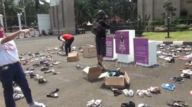 Activists place 500 pairs of shoes outside Jakarta government building in response to delayed Sexual Violence Bill