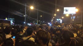 Large crowd of anti-government protesters gather outside major bank in Bangkok