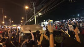 Watch Bangkok protesters light up sky with their mobile phones