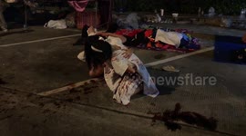 Protesters stage bizarre performance with fake blood in Bangkok, Thailand