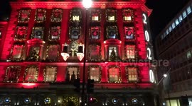 Fortnum and Mason Piccadilly evening clock ceremony with famous luxury store dressed for Christmas 2020