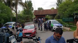 Police, journalists outside Diego Maradona's residence after football legend dies