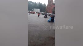 Local wade through knee-deep floodwater after Cyclone Nivar makes landfall