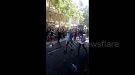 Argentine fans dismantle barriers and skip queues to view Diego Maradona's body lying in state