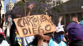 Fans gather in their thousands in Buenos Aires to bid final farewell to Diego Maradona