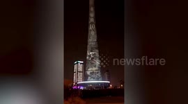 Chinese tower illuminated in honour of Diego Maradona