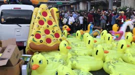Thai protests blow up with inflatable ducks, unicorns and even pizzas!