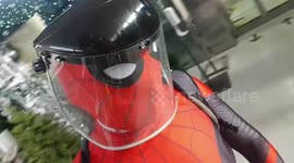 Filipino comic fan goes Christmas shopping dressed as Spider-Man