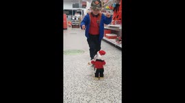 Kid dancing to Santa toy