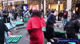 Protesters tear down street barriers at central London lockdown protest