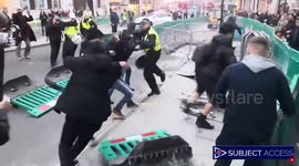 Police attacked, barriers thrown during London anti-lockdown protest