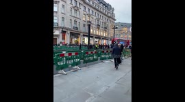 London lockdown protestors throw barriers at police and a Lamborghini