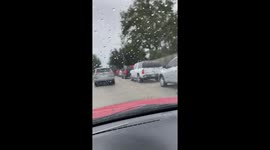Huge line of cars at food bank in Houston the day before Thanksgiving