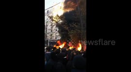 Protesters burn cars at security law protest in Paris, France