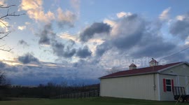 Cloudy barn side timelapse
