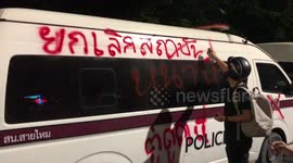 Thai police vehicles vandalised by demonstrators in Bangkok