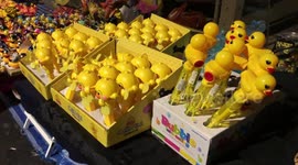 Thai hawkers turn anti-government protests into duck-themed sales opportunity