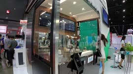 Barista robot serves coffee to customers at tech show in Thailand