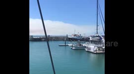 Wall of smoke on Australia's popular Fraser Island caused by bushfire