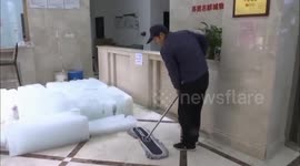 Chinese residents dump ice in property management office to complain about no heating in winter