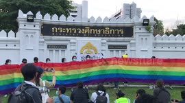 Thai Students Unfurl LGBT Rainbow Flag On Government Building