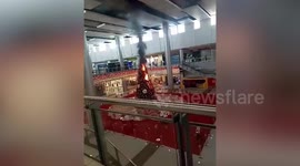 Christmas tree catches fire in shopping mall in the Philippines