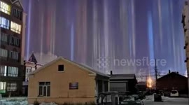Ice crystal reflections form light pillars above Chinese city in natural phenomenon