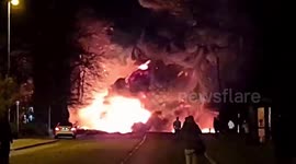 Massive blaze erupts after cargo truck crashes into gas station in UK
