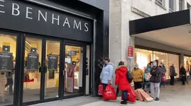 Eager Bristol shoppers queue outside troubled store Debenhams as shops reopen in England
